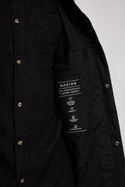 Schwarze Jacke mit Mazine Markenetikett