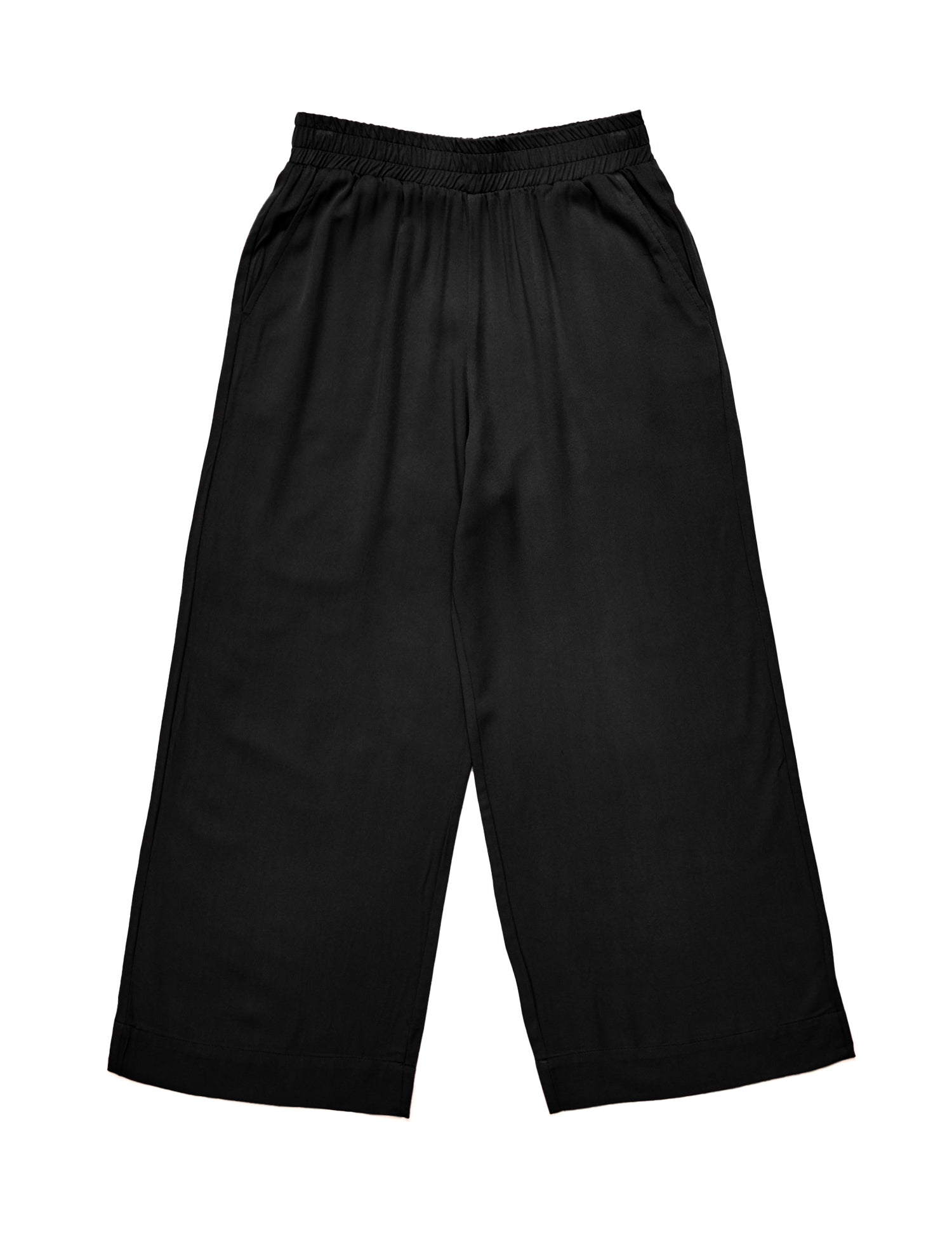 Schwarze Sporthose auf weißem Hintergrund