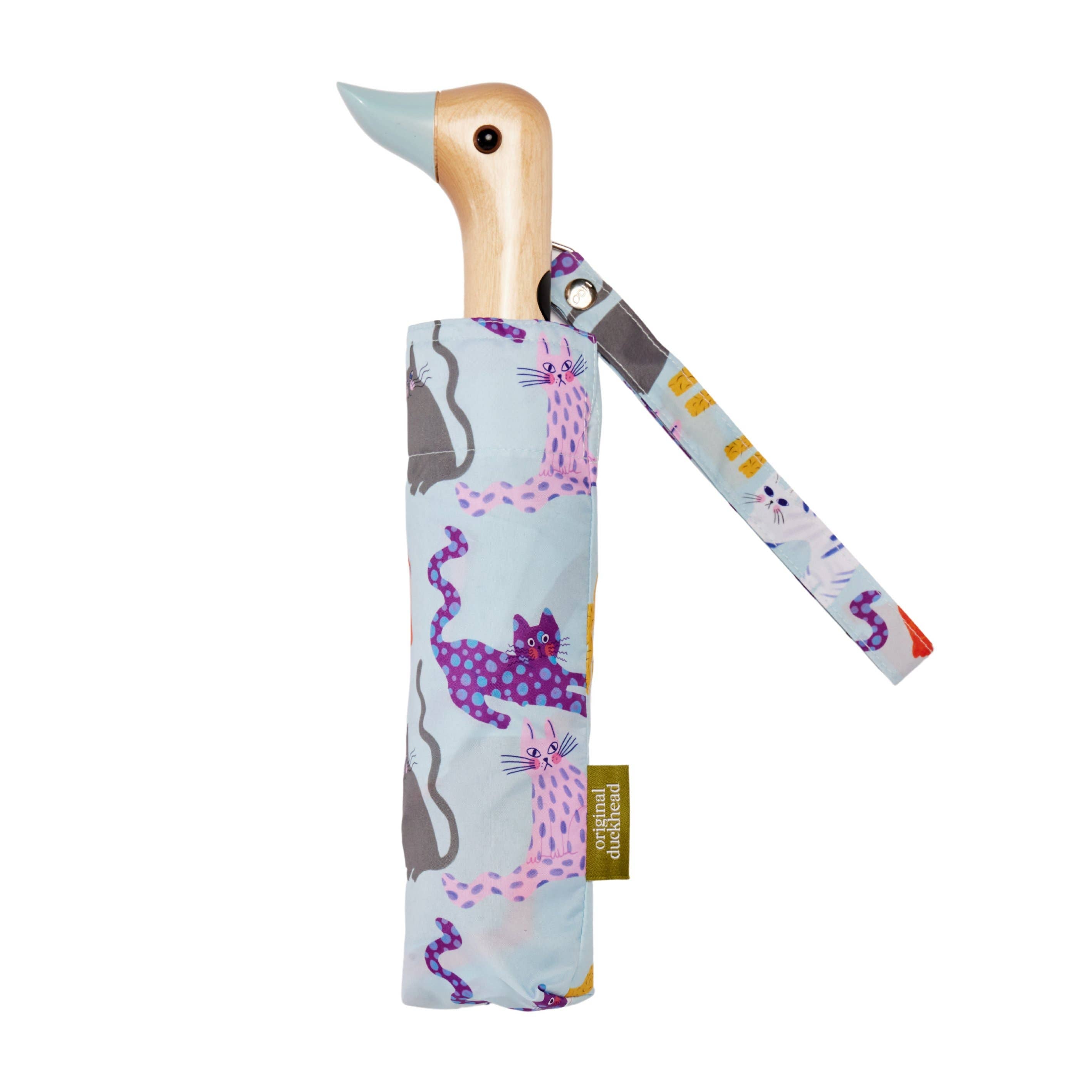 Eisblauer Enten-Regenschirm mit Katzendruck