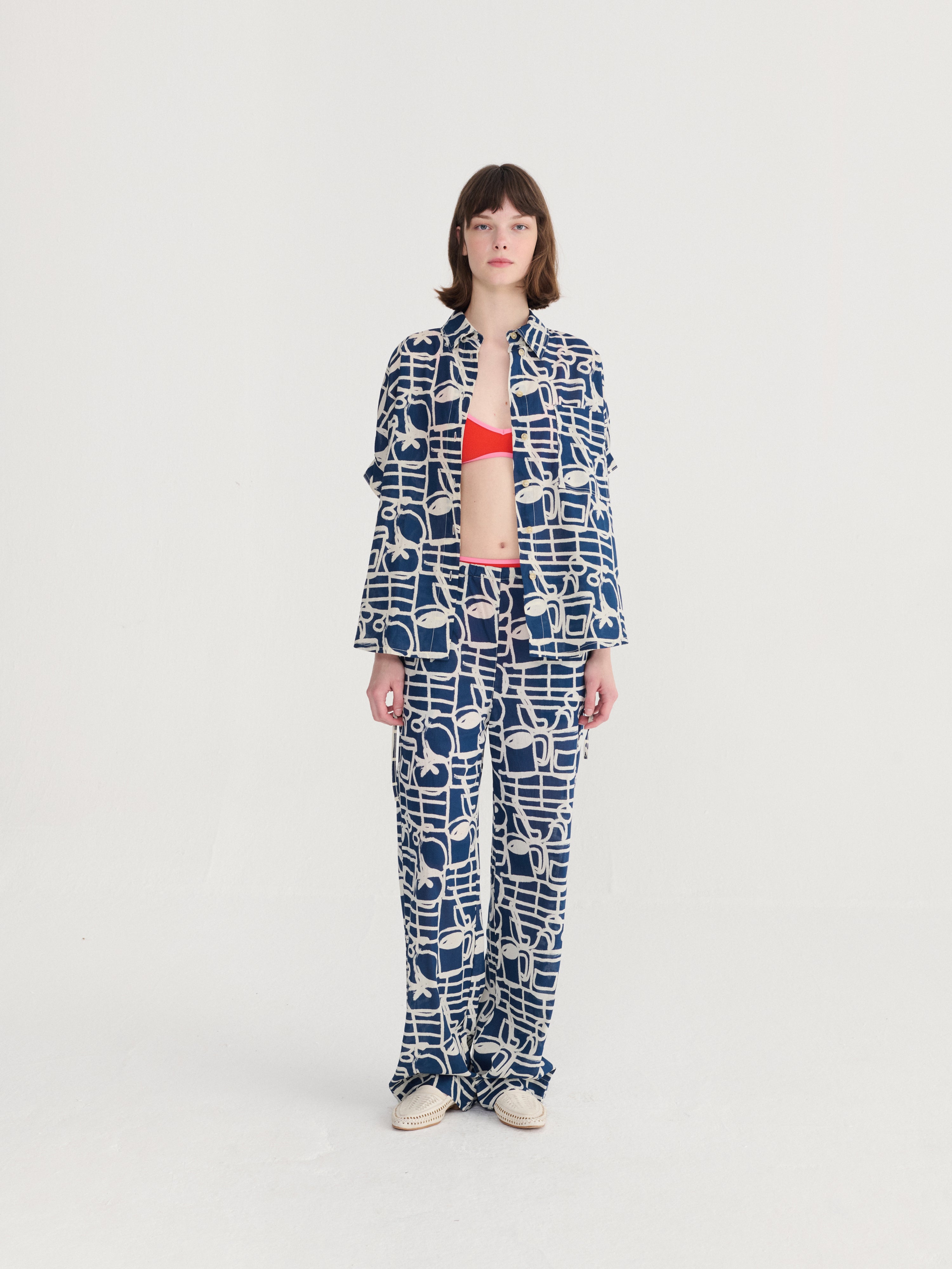 Cookery festival pattern wide-leg trousers