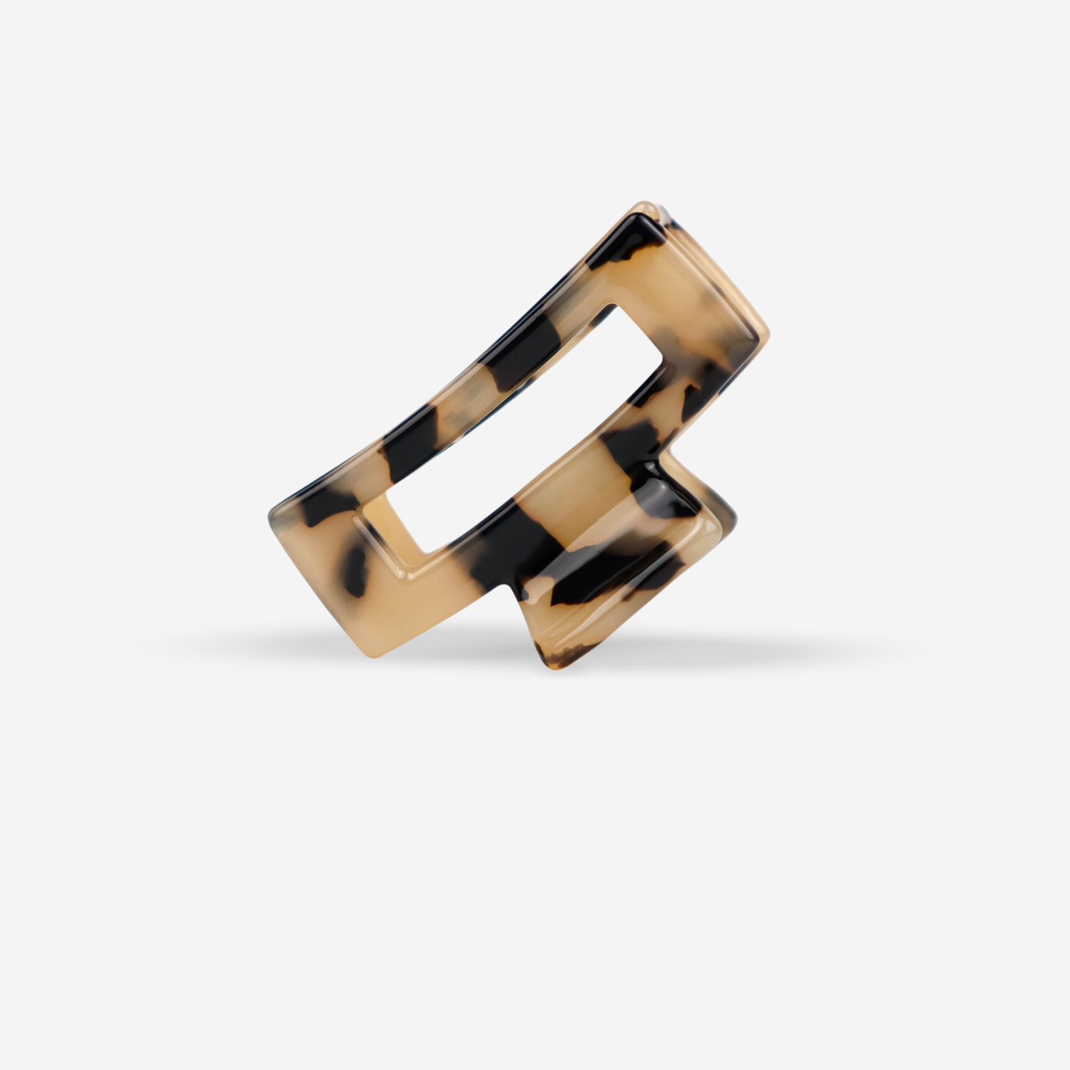 Moderner geometrischer Armreif in Schwarz und Gold