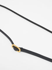 Schwarzes Seil mit goldener Schlaufe