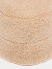 Nahaufnahme von beigem Flauschmaterial