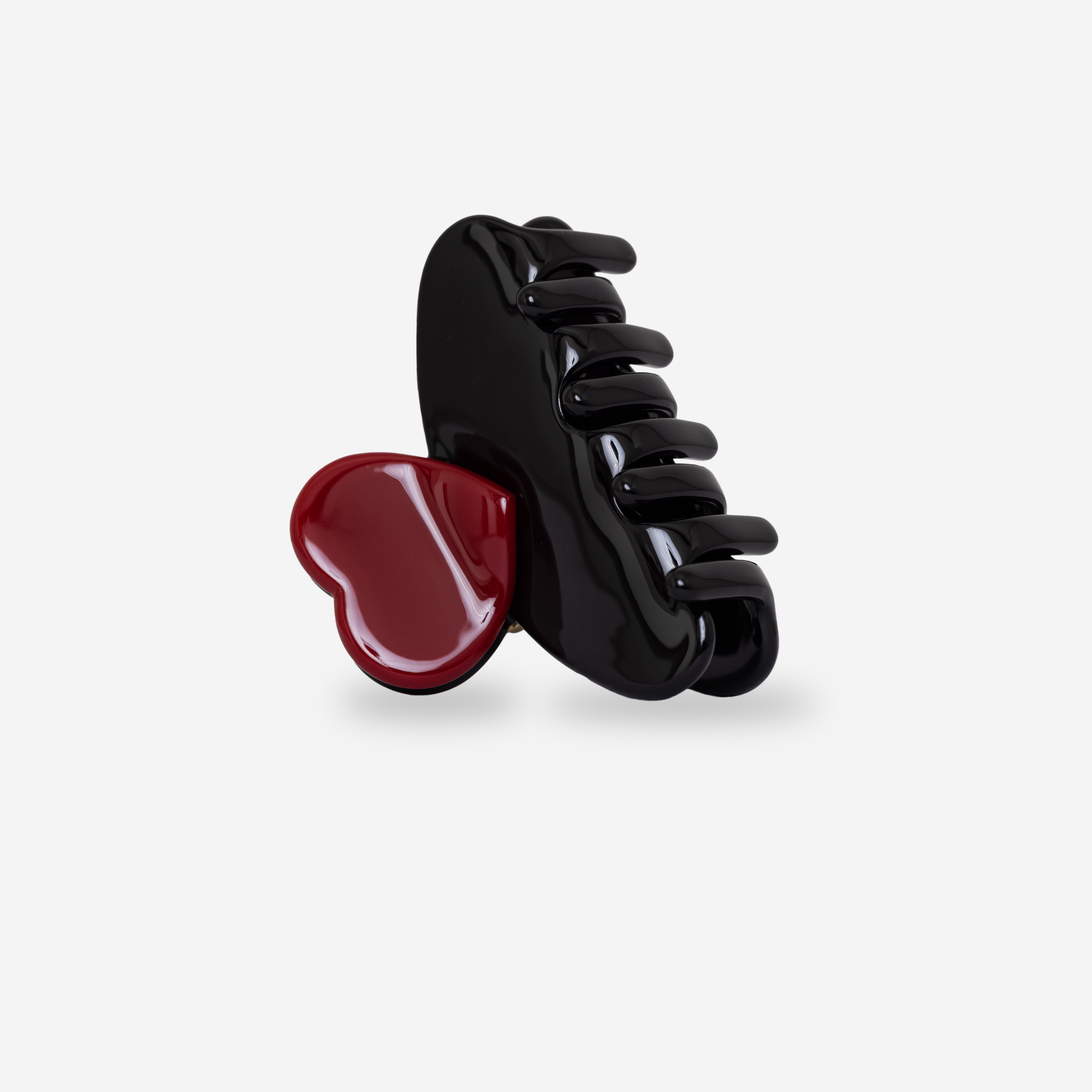 Schwarze Haarklammer mit rotem Lackklecks