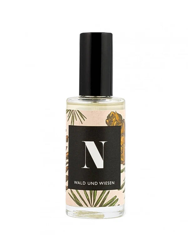 Parfümflasche mit Blättermuster und Etikett &quot;Wald und Wiesen