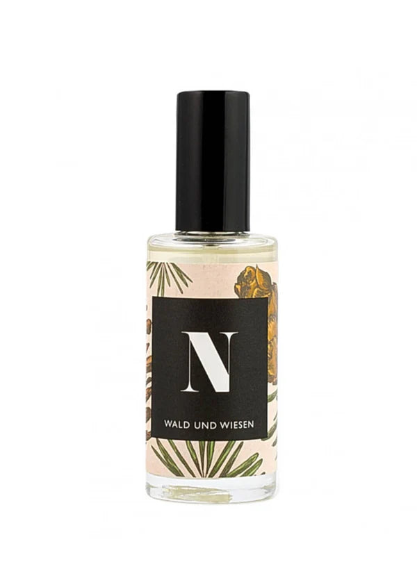 Parfümflasche mit Blättermuster und Etikett &quot;Wald und Wiesen