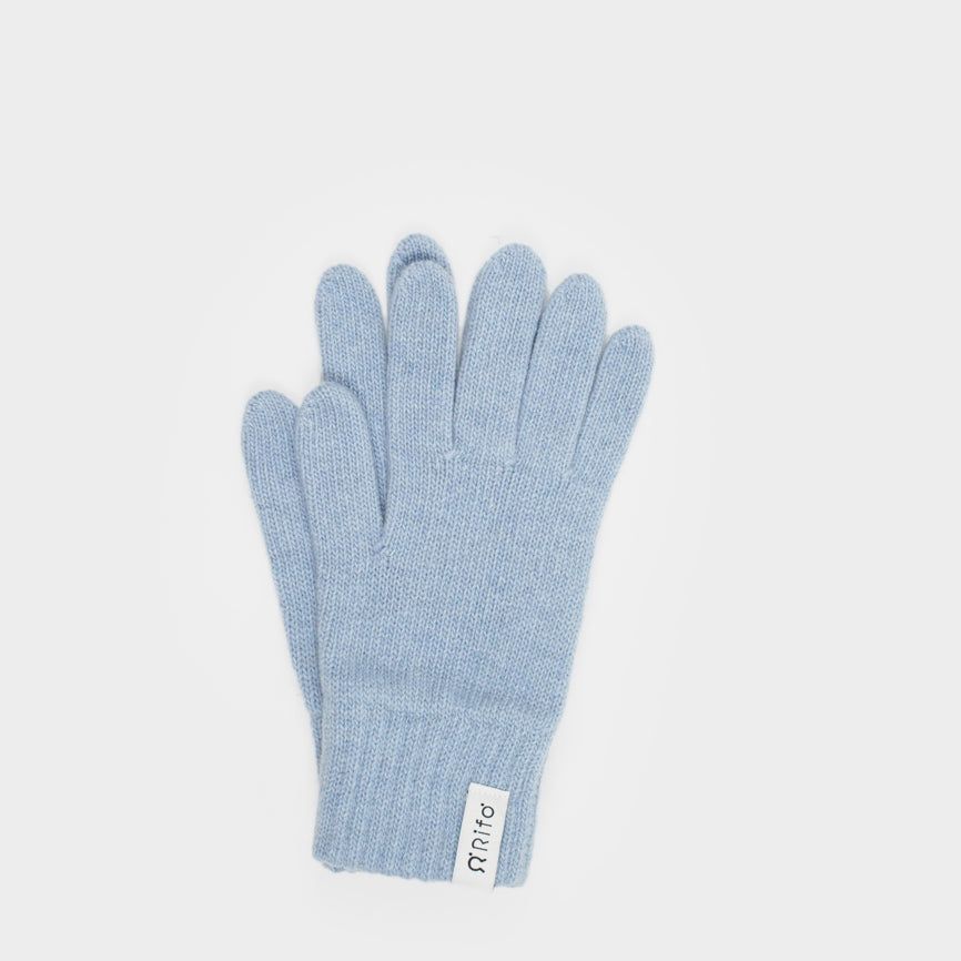 Blaue Strickhandschuhe auf weißem Hintergrund